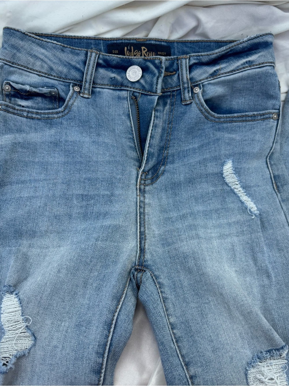 Indigo Rein Women's High Rise Light Blue Distressed Jeans